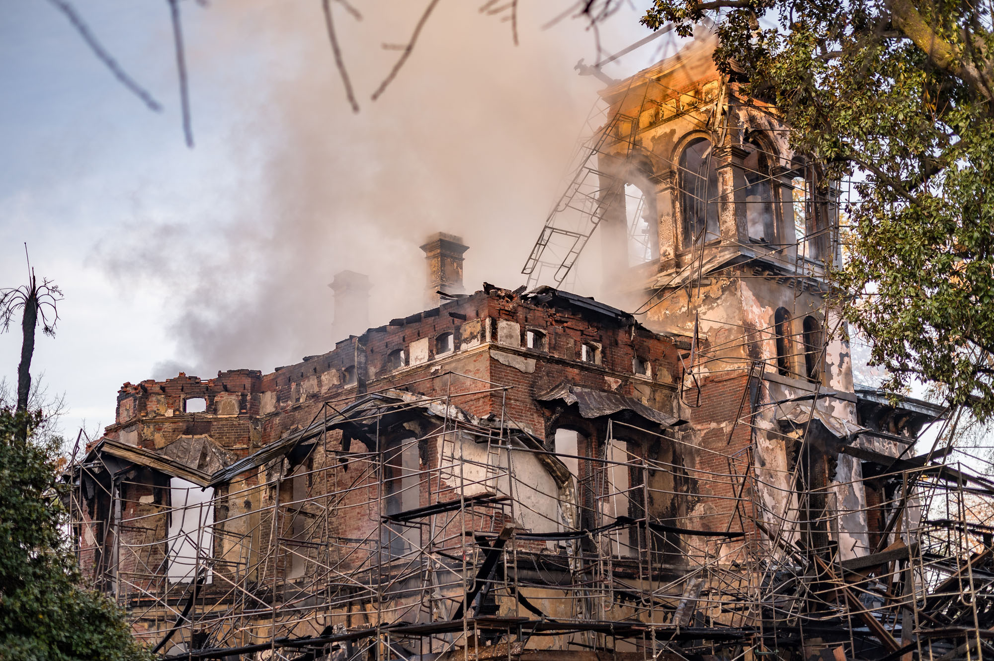 Image of the severely damaged Bidwell Mansion after an arson fire on Dec. 11, 2024